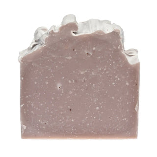 Bar of soap with a textured surface on a white background