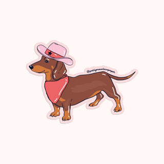 A sticker with the illustration of a wiener dog in a cowboy hat
