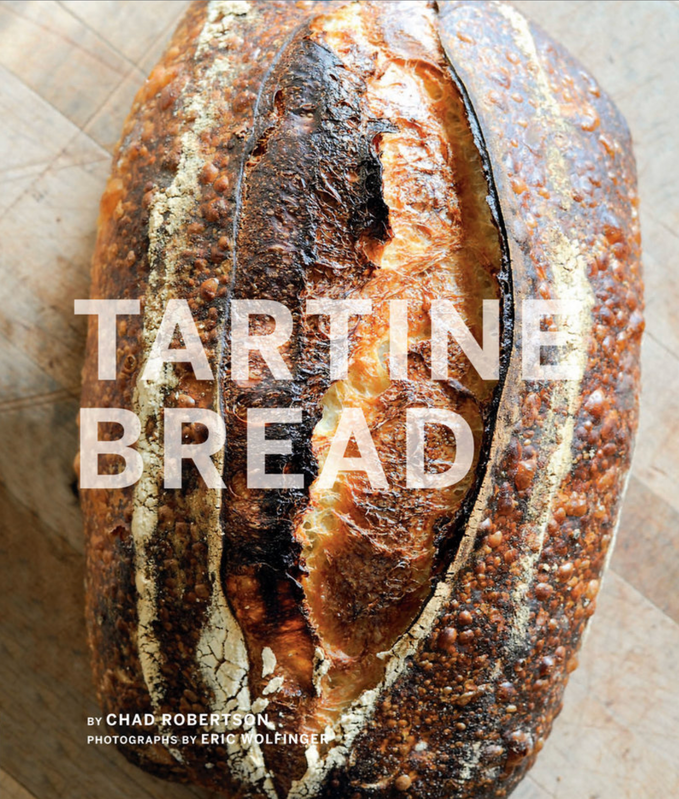 Book cover of 'Tartine Bread' with a loaf of bread and the author's name.