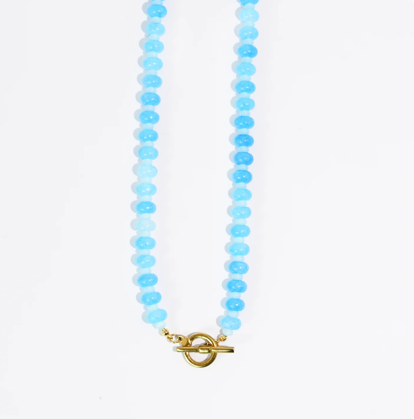 A blue beaded necklace against a white background.