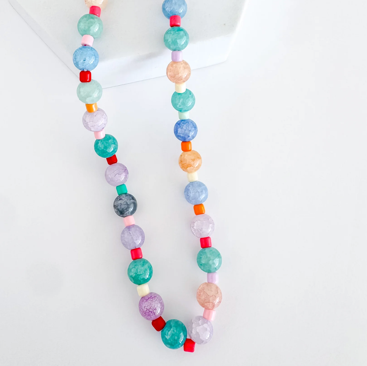 a smooth gem beaded necklace.