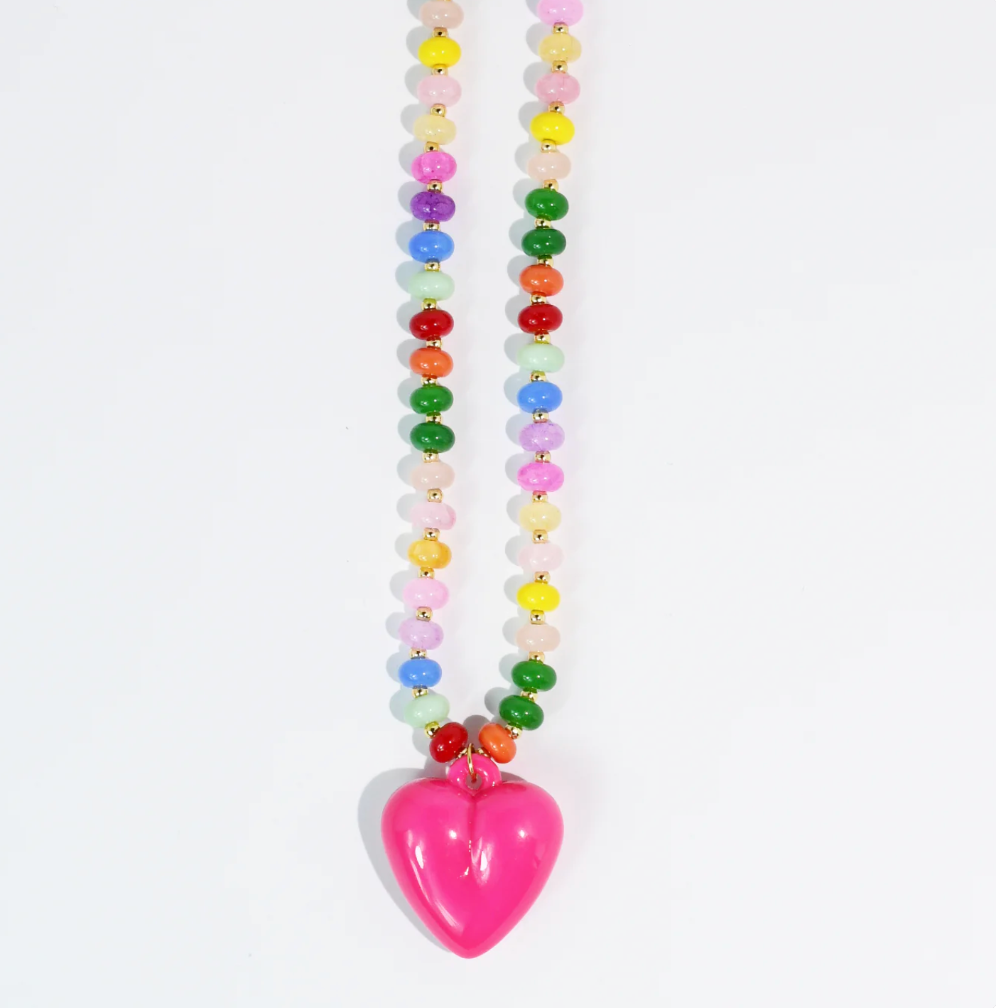 A beaded necklace with a heart pendant. 