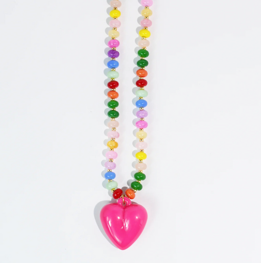 A beaded necklace with a heart pendant. 