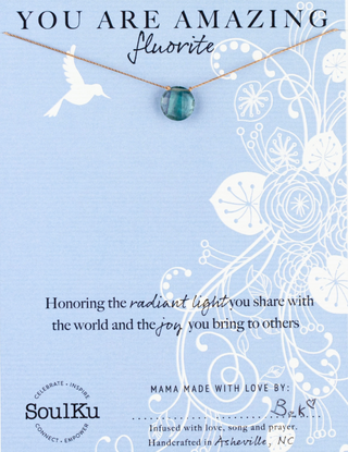 Necklace with fluorite stone on a decorative card with text and SoulKu branding.