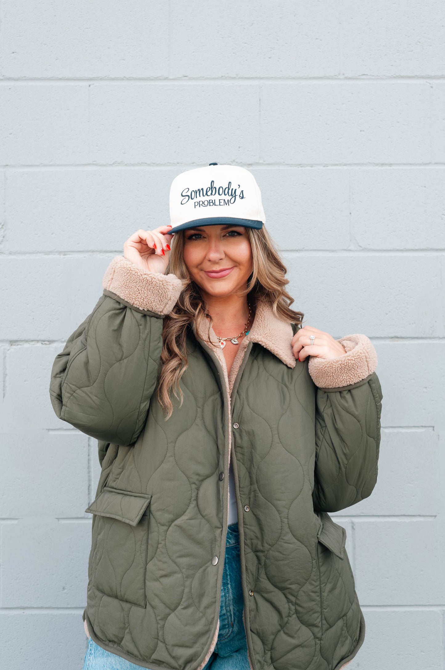 Somebody's Problem Embroidered Trucker Hat