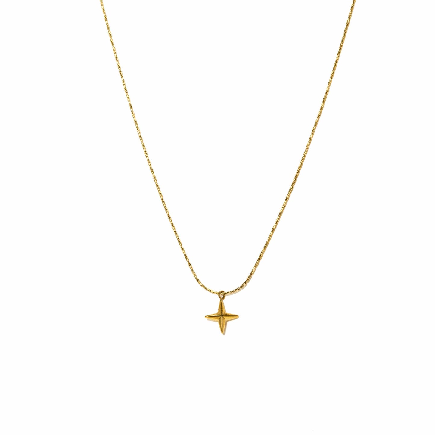 Gold necklace with a star pendant on a white background