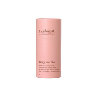 Pink deodorant container labeled 'routine.' with 'sexy sadie' description on a white background