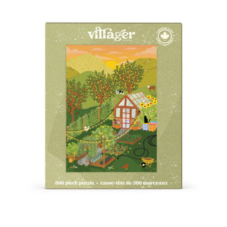 A rectangular puzzle box for a 800-piece village-themed puzzle. The box has a light olive-green border with the brand name 'villager' at the top and a colorful illustrated scene showing a garden, greenhouse, trees, and small buildings.