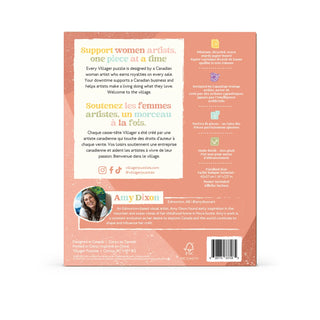 The back of a coral-pink product box or packaging insert, featuring text in English and French, a small photo of Amy Dixon, social media handles, and a barcode on a white background.