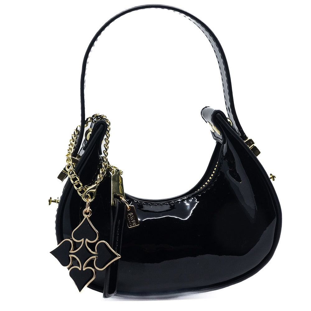 Black handbag with gold chain and bat design on a white background