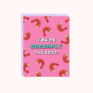 Card with red cartoon shrimps on it with blue and white text saying You're Shrimply the Best!