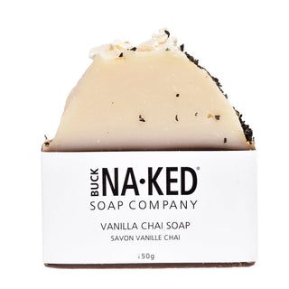 A packaged bar of Vanilla Chai Soap with visible vanilla and spice specks, set against a white background.
