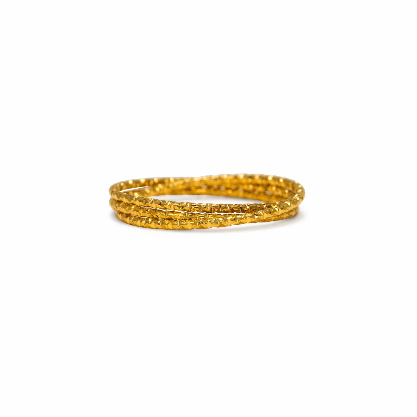 Two gold rings on a white background