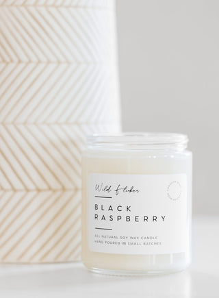 black raspberry candle on a table