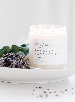 candle on a tray scented with eucalyptus and lavender