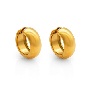 close up on round gold hoop earrings