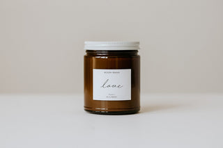 Brown jar with a white label on a light gray background