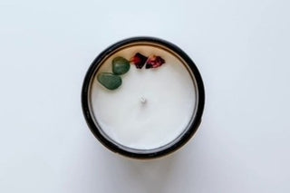  top view of a candle with crystals in it