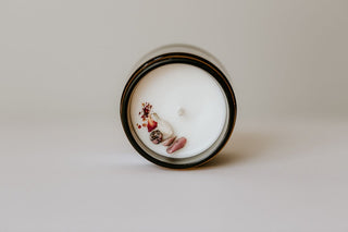 top view of a candle with crystals in it