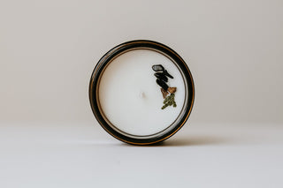 top view of a candle with a crystal