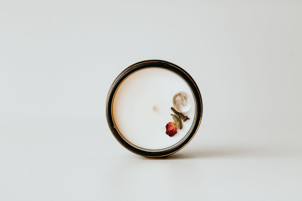 Round ceramic plate with floral design on a white background
