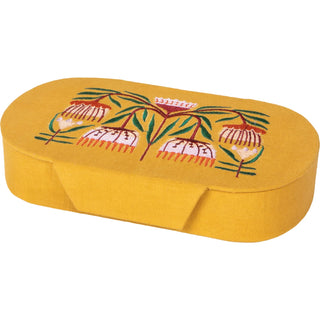 Yellow fabric box with floral design on a white background