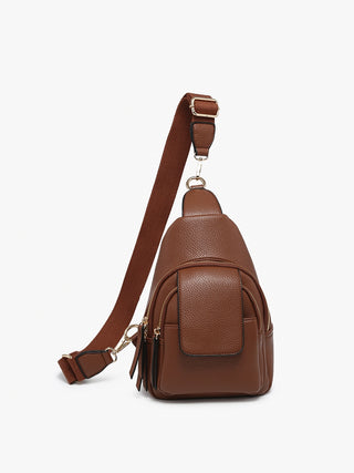 Brown leather sling bag on a white background