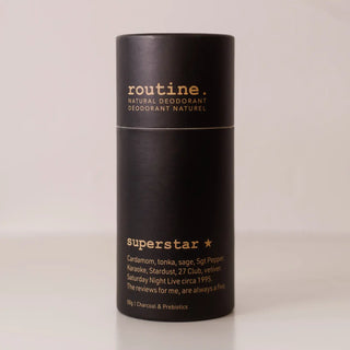 Routine Natural deodorant stick against a neutral background.
