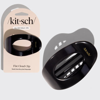 Black hair clip with 'kit-sch' branding on a light gray background
