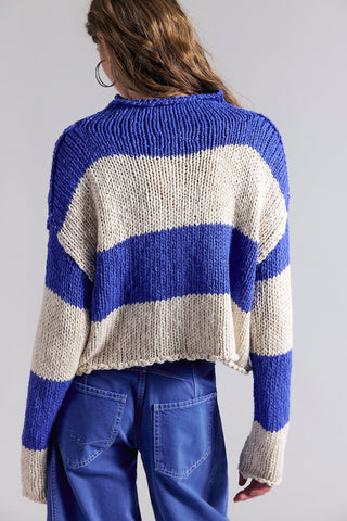 women wearing a blue & white Stripe sweater