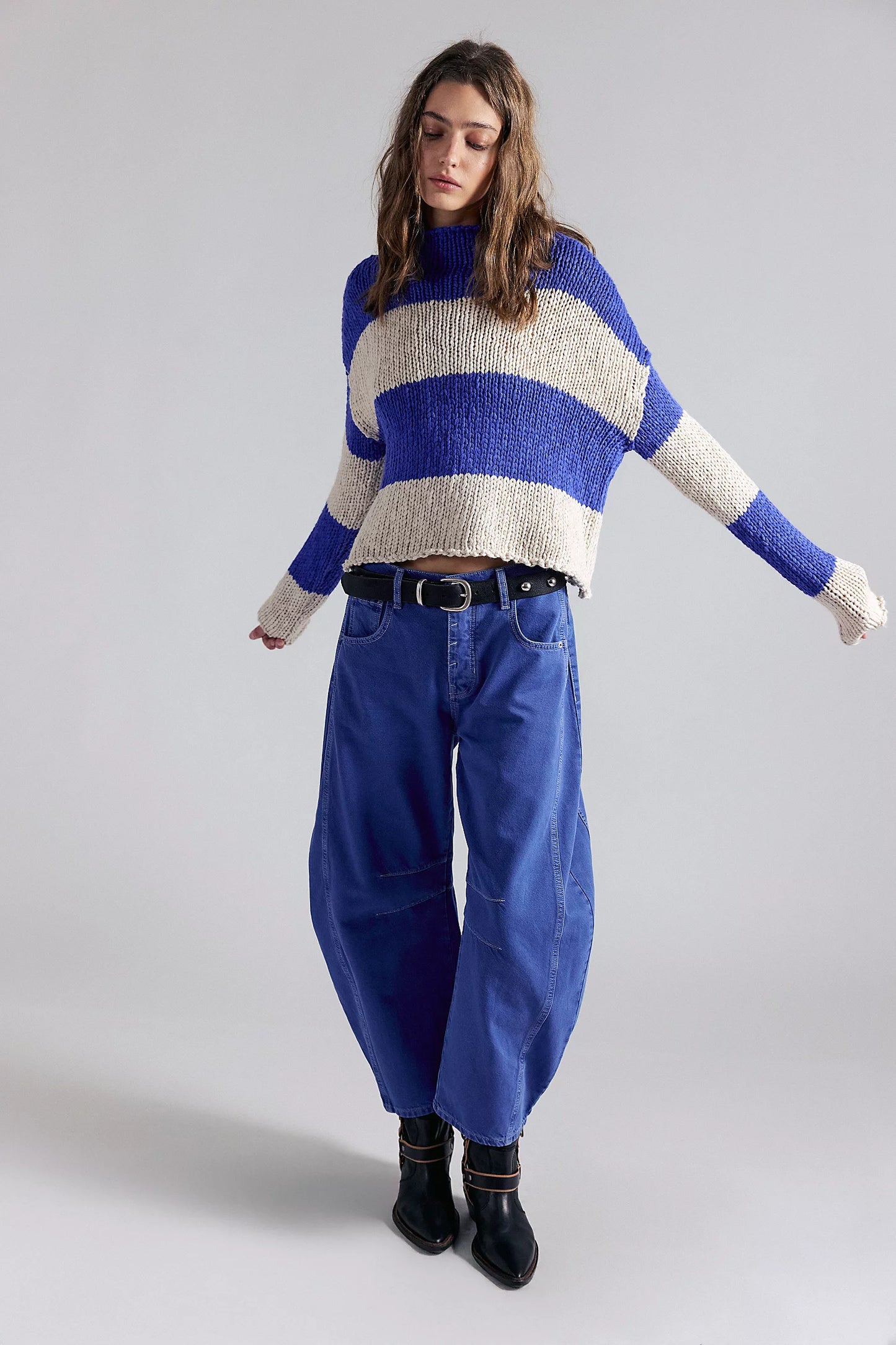 women wearing a yellow & white Stripe sweater