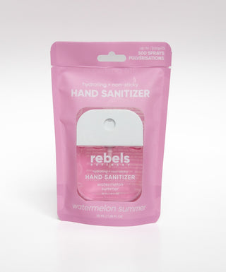 Pink hand sanitizer pouch with 'rebels' branding on a white background