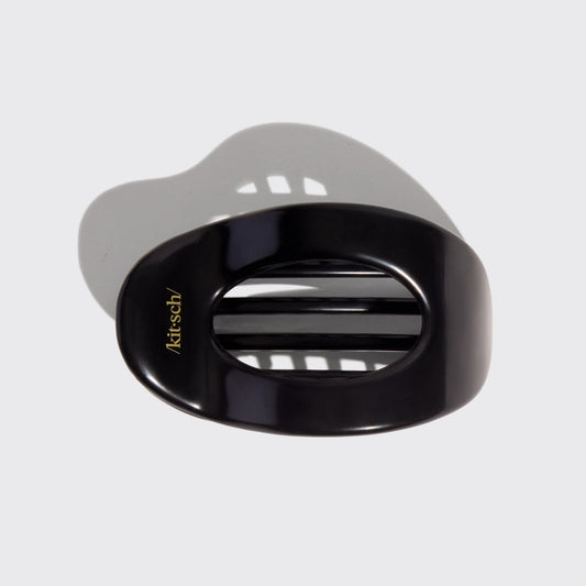 Black and gray hair clip with 'kitsch' branding on a light gray background