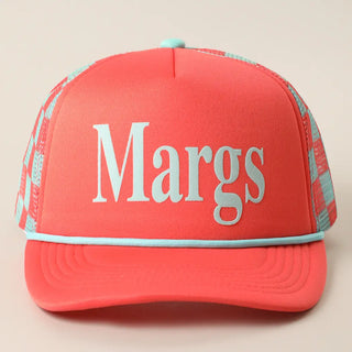 Coral cap with 'Margs' text on a beige background