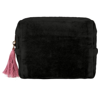 A black plush velvet cosmetic pouch with a pink tassel zipper pull, shown on a plain white background.