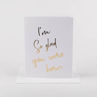 Greeting card with 'I'm so glad you were born' text on a white background