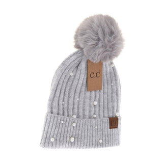 Gray knit beanie with pom-pom and sequins on a white background