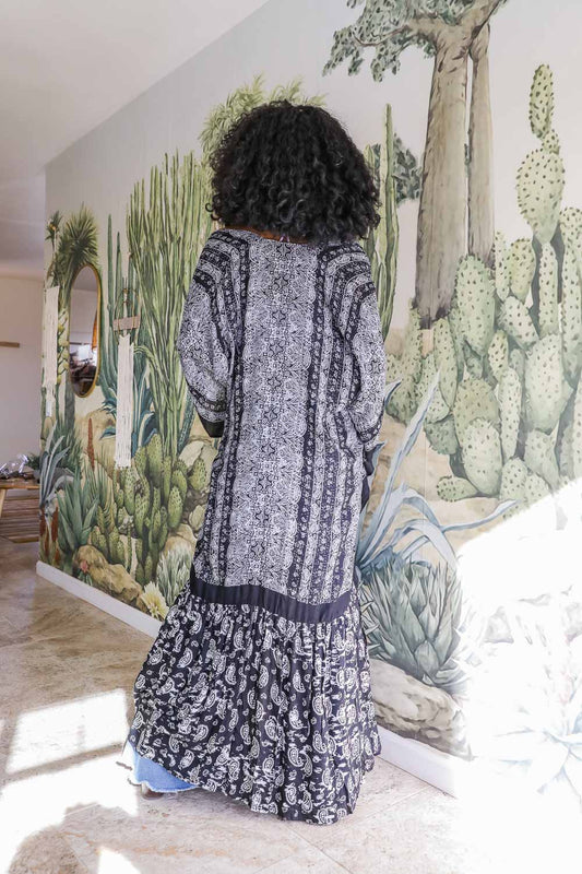 Women in long bohemian kimono shawl cover up