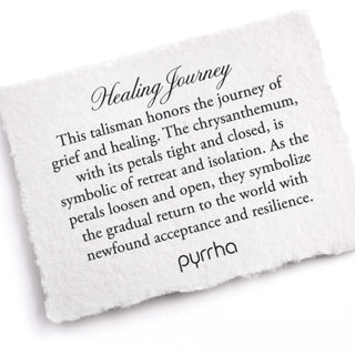 White pillow with text about 'Healing Journey' and 'pyrrha' branding on a white background