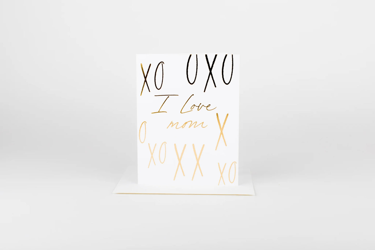 White card with gold and black text on a white background