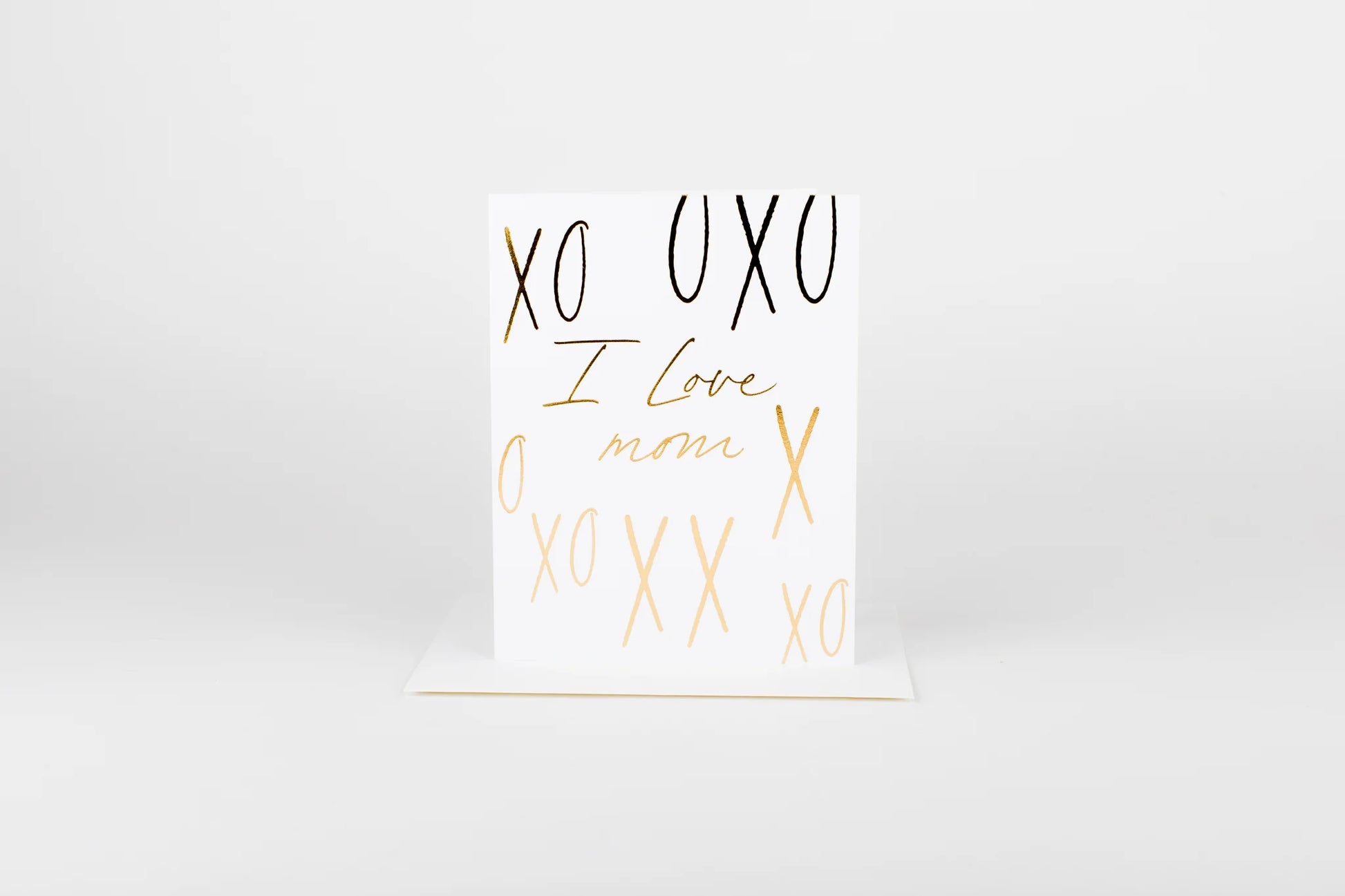 White card with gold and black text on a white background