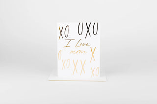 White card with gold and black text on a white background
