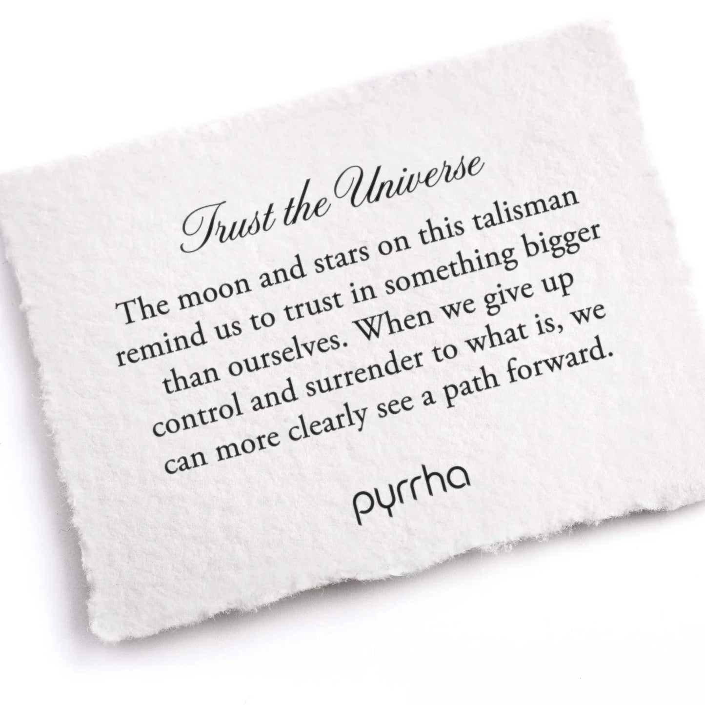 White pillow with text and 'pyrrha' branding on a white background