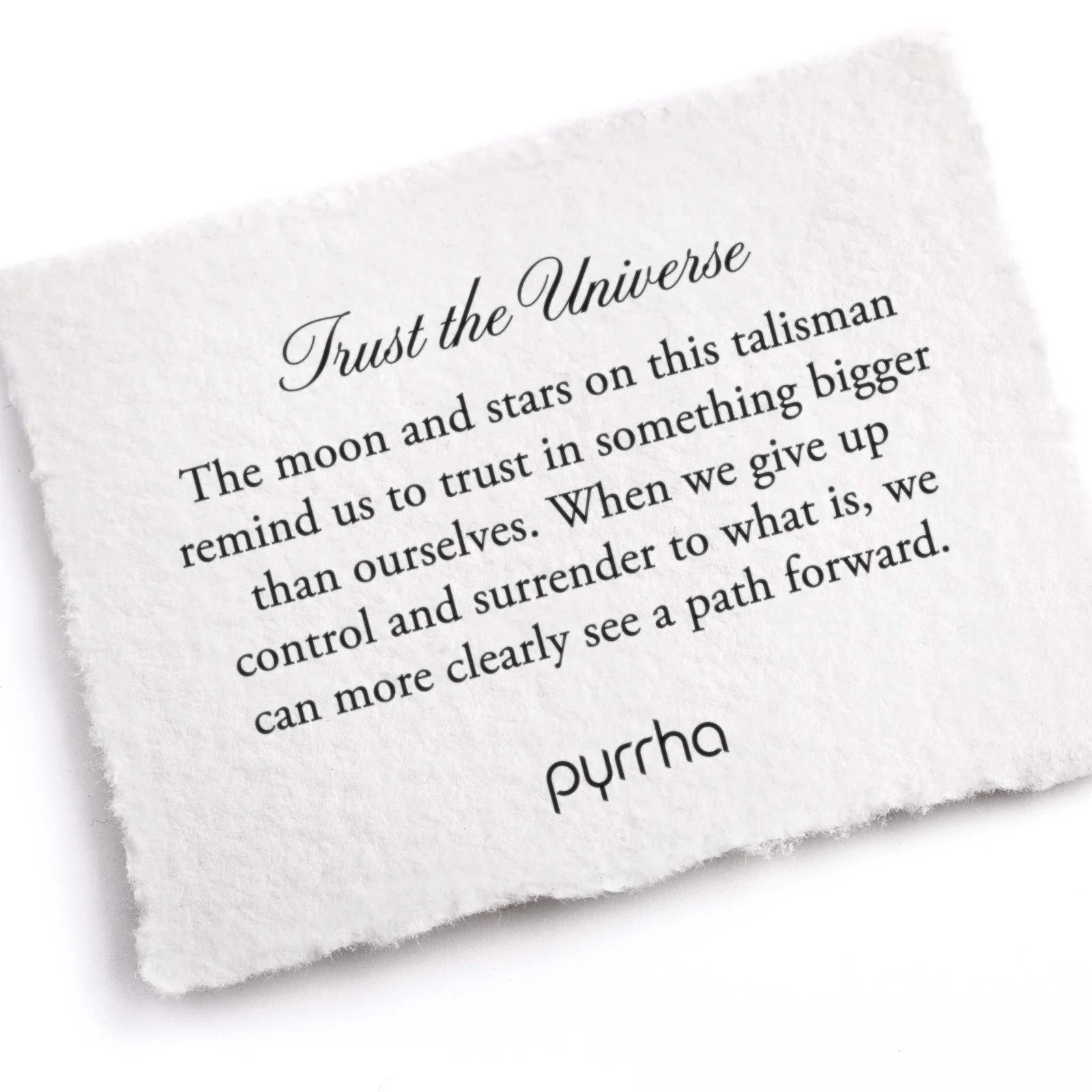 White pillow with text and 'pyrrha' branding on a white background