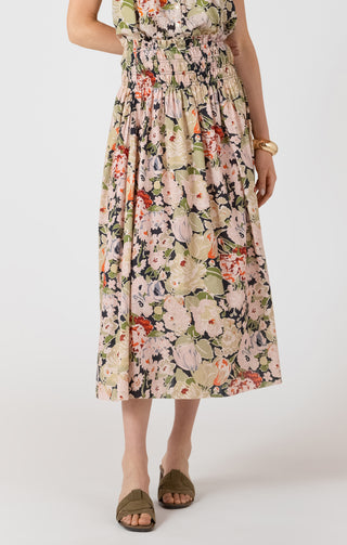 Woman wearing a floral dress on a white background