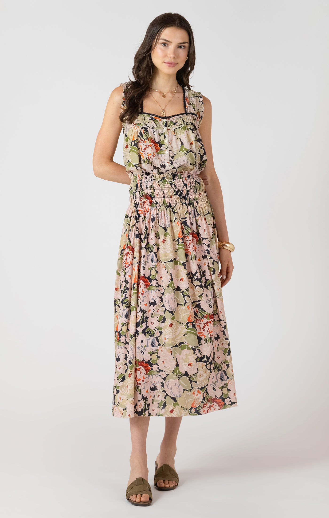 Woman wearing a floral dress on a white background