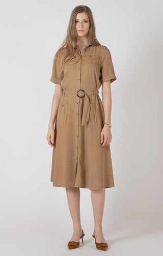 Woman wearing a brown dress with a belt on a white background