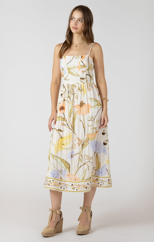 Woman wearing a floral dress on a white background