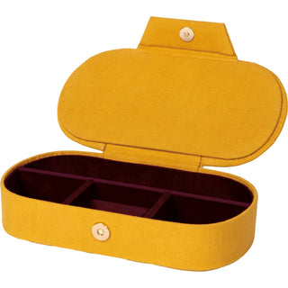 The interior of a yellow jewelry box against a neutral background. 