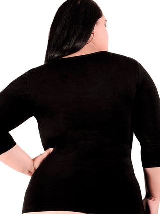 A woman wearing a Curvy bamboo 3/4 sleeve top. 